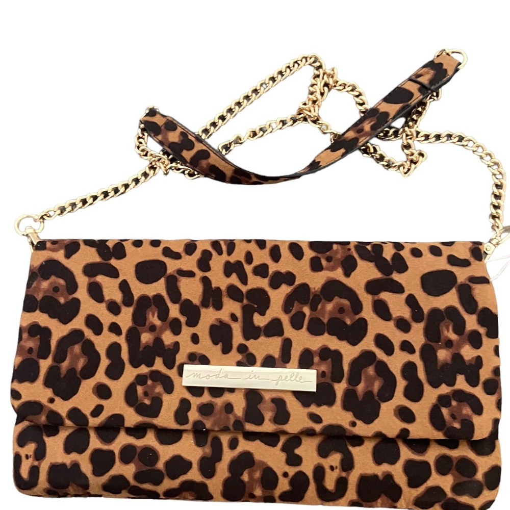 Leopard print flap over handbag.